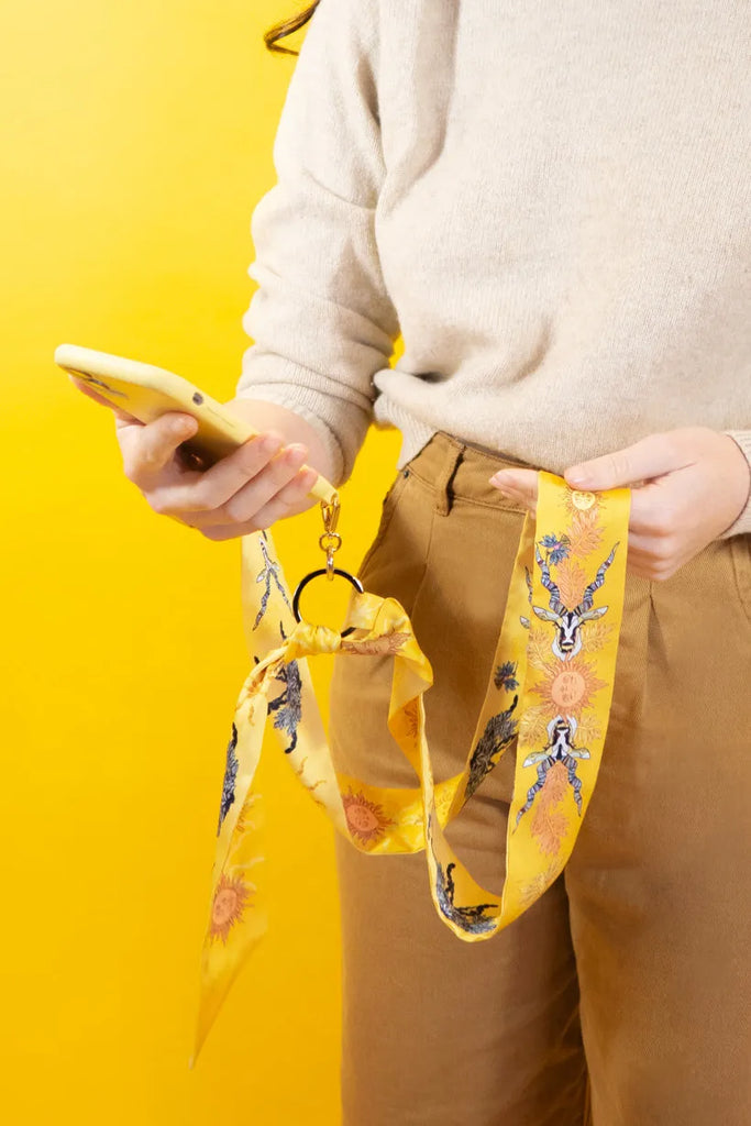 Bandoulière de téléphone réversible, les chamans du Soleil, jaune